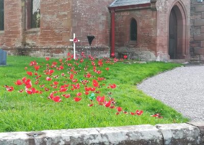 Handmade Poppies outside St James Church